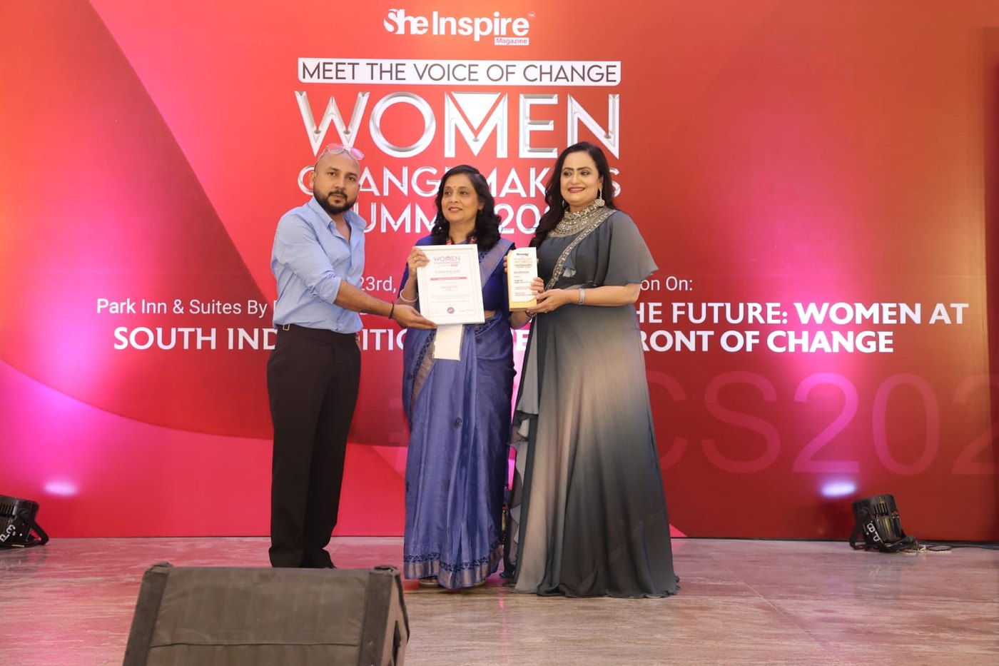 Shalini receiving recognition at Women Changemakers Summit 2026